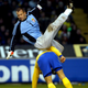 In a 2002 international match against Sweden, Király takes a tumble after a challege with Zlatan Ibrahimović. A good view of how he tucks the bottoms into his socks. Photo via AP